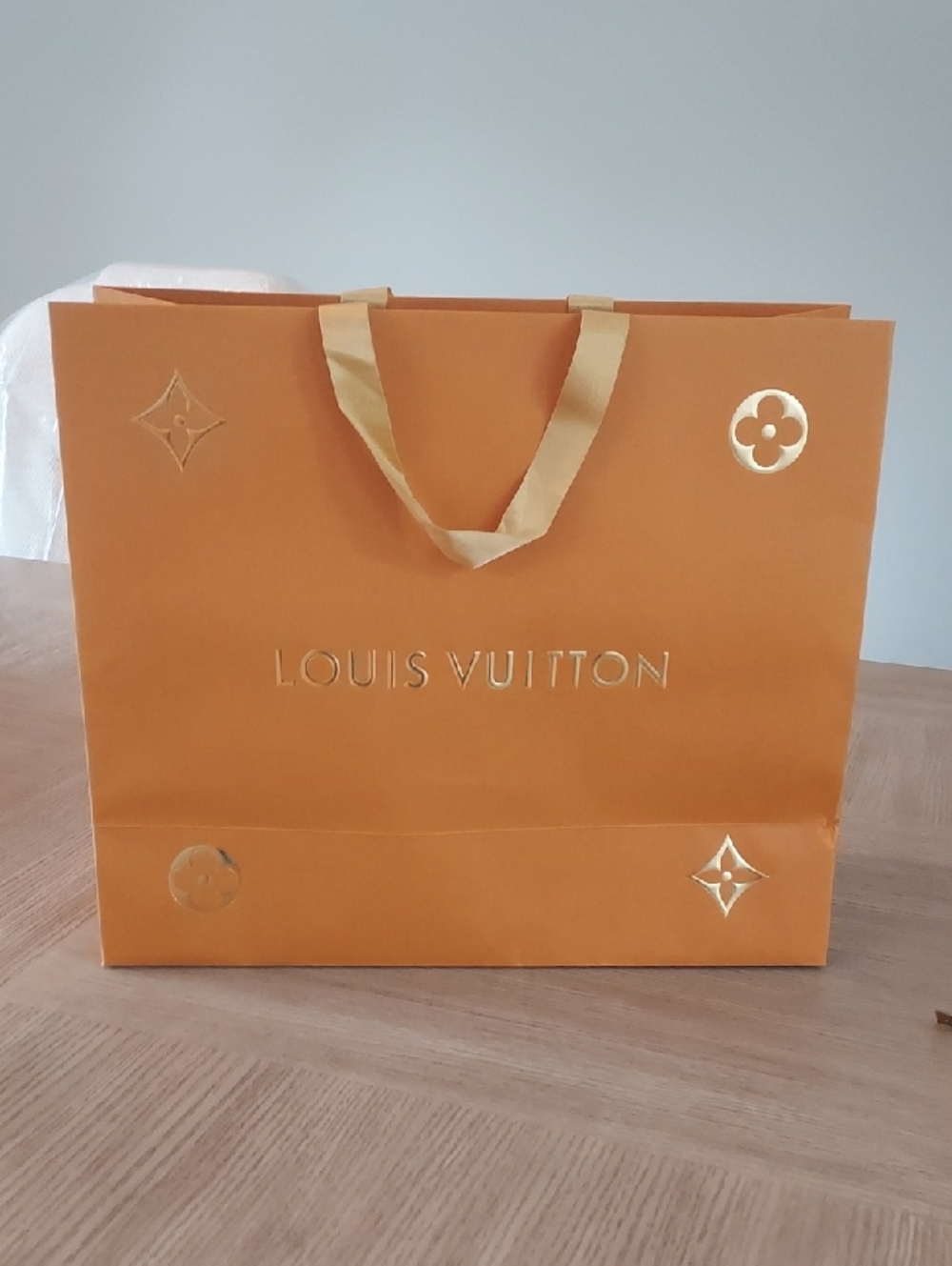 Authentic Louis Vuitton Orange Branded Tote with Gold Accents